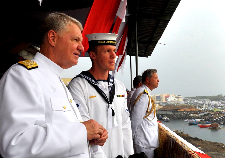 US Navy 090819-N-8273J-494 Chief of Naval Operations (CNO) Adm. Gary Roughead, left, speaks with a Royal Australian Navy Sailor during the Indonesian International Fleet Review