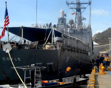US Navy 090823-N-4879G-162 Sailors assigned to the guided-missile frigate USS Doyle (FFG 39) move Project Handclasp materials onto a Colombian Coast Guard vessel
