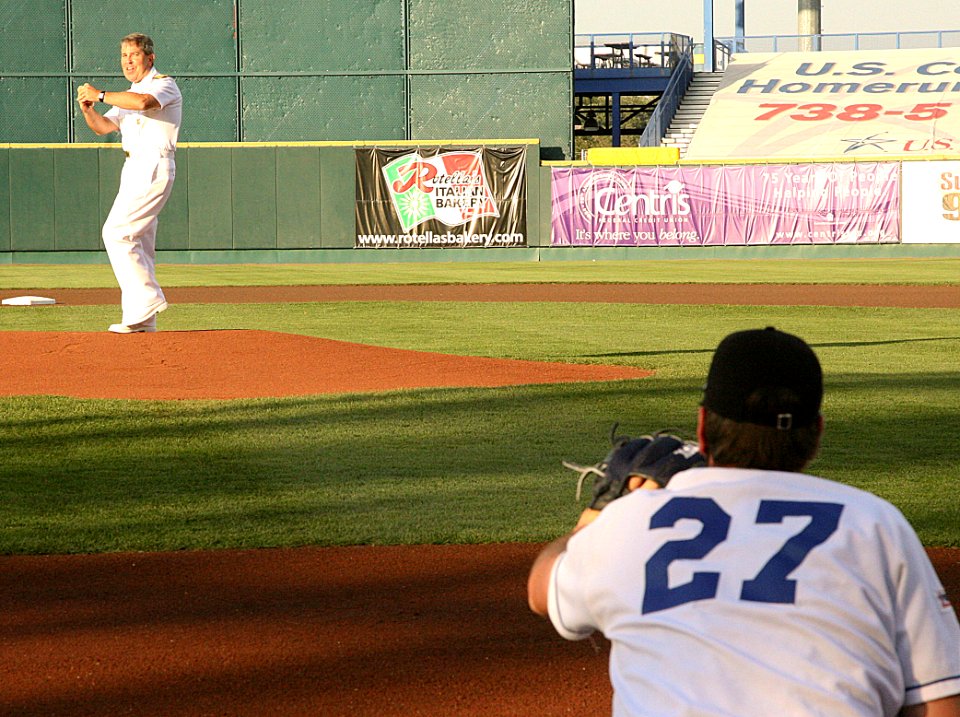 US Navy 090824-N-3271W-112 Rear Adm. Douglas J. McAneny, commander, Submarine Force, U.S. Pacific Fleet, throws the first pitch before a minor league baseball game between the Omaha Royals and the Oklahoma City Red Hawks