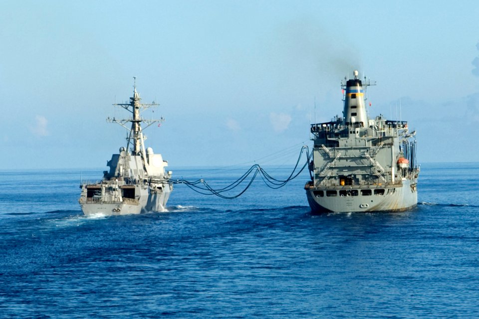 US Navy 090823-N-9123L-007 The guided-missile destroyer USS Mustin (DDG 89) conducts an underway replenishment with the Military Sealift Command fleet replenishment oiler USNS Pecos (T-AO-197)