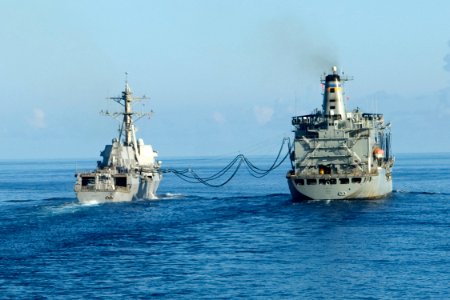 US Navy 090823-N-9123L-007 The guided-missile destroyer USS Mustin (DDG 89) conducts an underway replenishment with the Military Sealift Command fleet replenishment oiler USNS Pecos (T-AO-197)