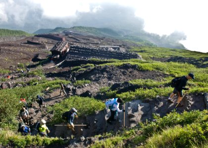 US Navy 090824-N-5253W-033 Yokosuka area chief petty officer (CPO) selects and members of the Far East CPO Mess make the ascent to the 12,388-foot summit of Mt. Fuji photo