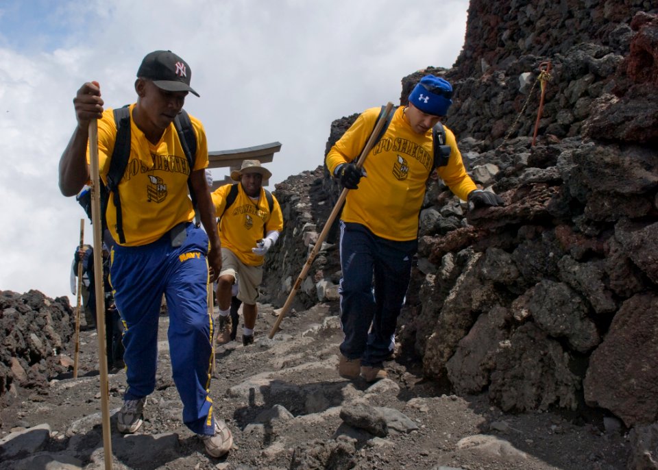 US Navy 090824-N-5253W-065 Yokosuka area chief petty officer (CPO) selects pass through the final Torii gate to reach the 12,388-foot summit of Mt. Fuji