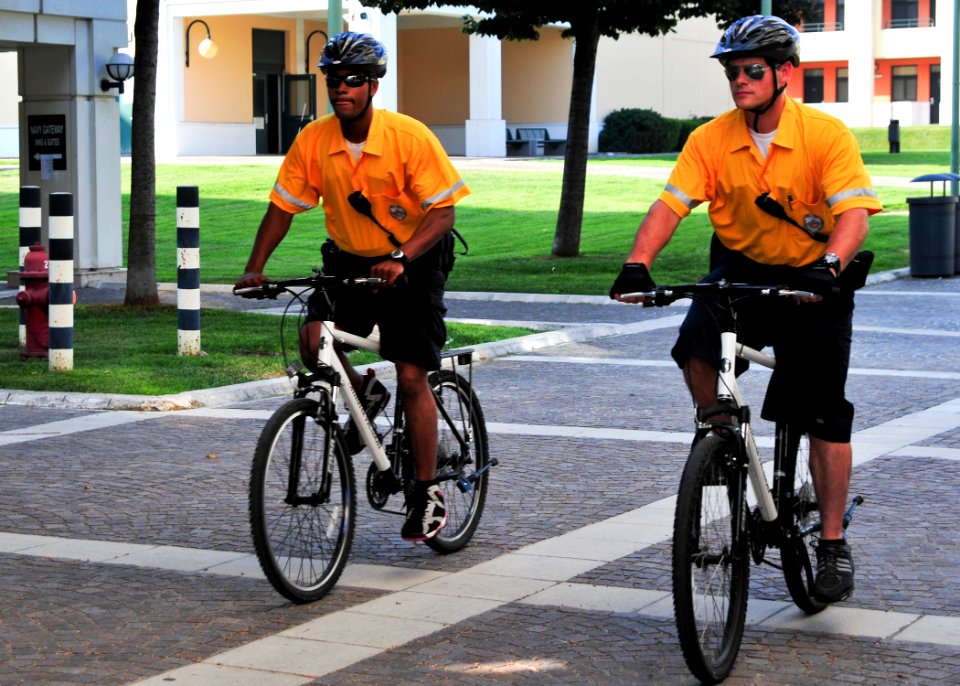 US Navy 090825-N-4044H-021 Bike patrolman Master-at-Arms 3rd Class Aaron Mark Isaac and Master-at-Arms 2nd Class Matthew L. Birmingham patrol on Naval Support Activity (NSA) Naples Capodichino base