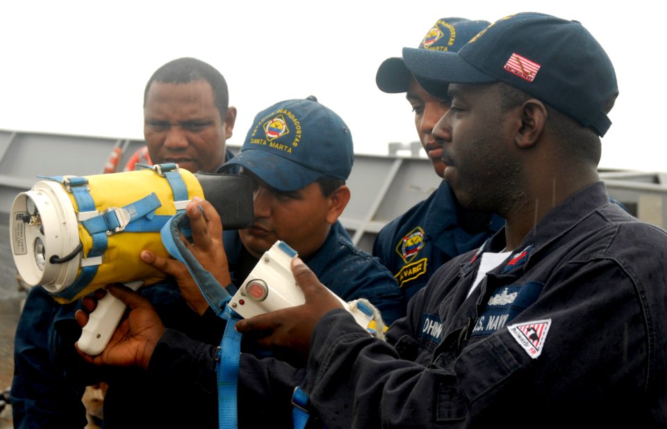 US Navy 090824-N-4879G-356 Damage Controlman 1st Class Andrae Johnson explains the use and functions of the naval fire fighter thermal imagery device