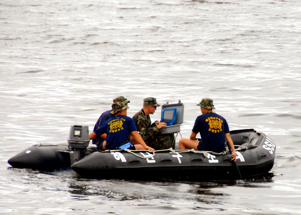 US Navy 090827-N-9573A-002 Construction Electrician 3rd Class Michael Mace, from Port Hueneme, Calif. assigned to Underwater Construction Team (UCT) 2, uses a Bathymetric Survey System during a training exercise