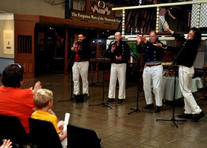 US Navy 090826-N-9671T-027 The Chanteymen, a singing group from the Ship's Company, perform during the