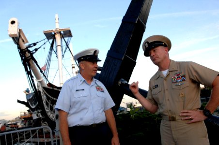 US Navy 090827-N-9818V-677 Master Chief Petty Officer of the Navy (MCPON) Rick West speaks with a U.S. Coast Guard chief petty officer in front of the USS Constitution