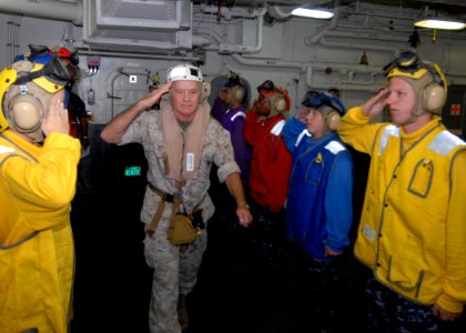 US Navy 090828-N-3592S-131 Lt. Gen. Dennis Hejlik, commanding general of the 2nd Marine Expeditionary Force, departs the amphibious assault ship USS Nassau (LHA 4) after a Quadrennial Defense Review tour