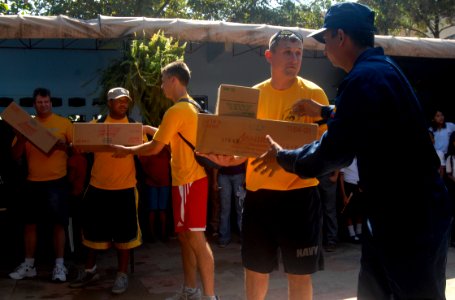 US Navy 090825-N-4879G-014 Sailors assigned to the guided-missile frigate USS Doyle (FFG 39) and the Colombian Coast Guard offload Project Handclasp supplies at a local Colombian school during a Southern Partnership 2009 commun
