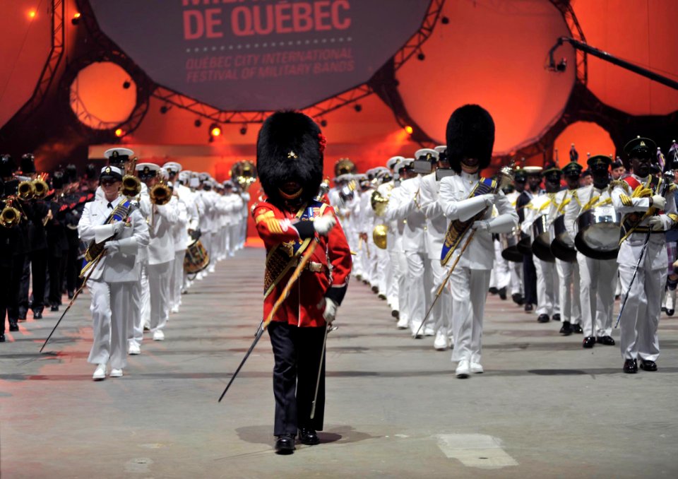 US Navy 090827-N-0773H-269 The U.S. Navy Band along with La Musique du Royal 22e Regiment, marches off during the closing ceremony of the Quebec Tattoo at the Pepsi Coliseum