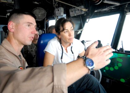 US Navy 090828-N-3592S-110 Lt. Col. Thomas Mitalski, executive officer of the 24th Marine Expeditionary Unit (24th MEU) Air Combat Element, discusses flight deck operations with Deputy Assistant Secretary of Defense for Plans J
