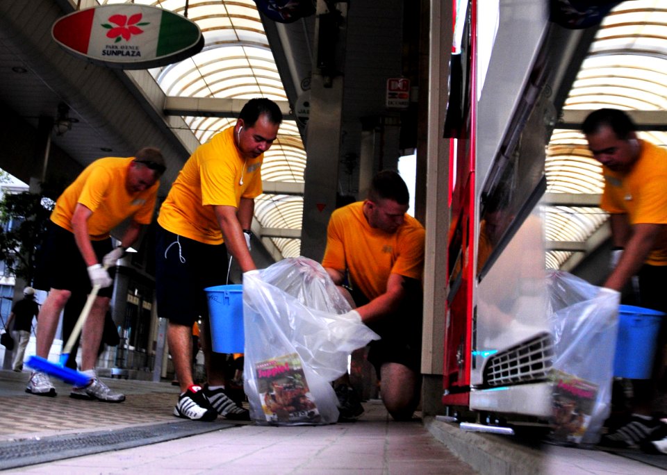US Navy 090828-N-0807W-525 Sailors assigned to Fleet Activities Sasebo pick up trash and debris during a community service beautification project
