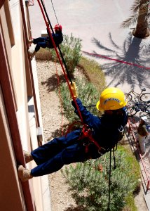 US Navy 090901-N-0803S-060 Naval Support Activity Bahrain Emergency Response Team members rappel during a cross-training evolution