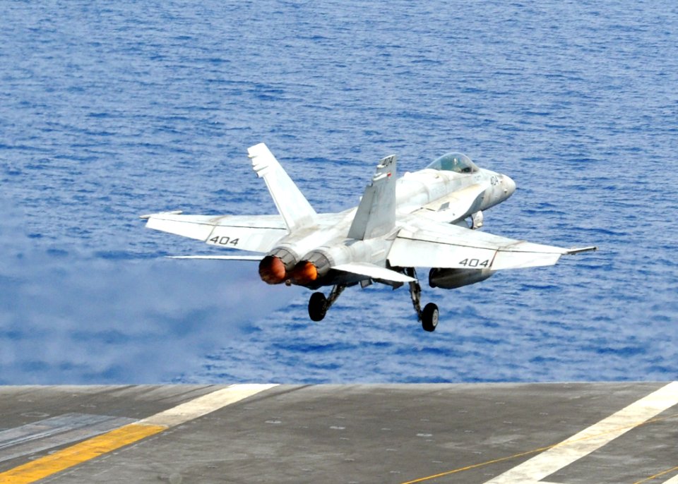 US Navy 090828-N-1644H-048 An F-A-18C Hornet from the Dambusters of Strike Fighter Squadron (VFA) 195 launches from the flight deck of USS George Washington (CVN 73)