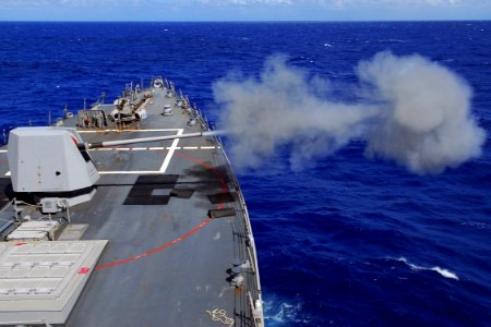 US Navy 090901-N-9123L-067 The guided-missile destroyer USS McCampbell (DDG 85) fires the MK 45 five-inch gun system off the coast of Okinawa, Japan during a live-fire exercise photo