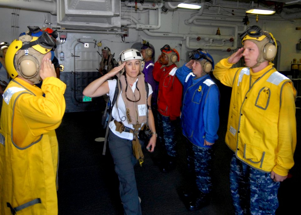 US Navy 090828-N-3592S-132 Deputy Assistant Secretary Of Defense for Plans Janine Davidson departs the amphibious assault ship USS NASSAU (LHA 4) after her Quadrennial Defense Review tour