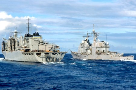 US Navy 090829-N-9123L-003 The Military Sealift Command fast combat support ship USNS Bridge (T-AOE 10) conducts an underway replenishment with the guided-missile cruiser USS Cowpens (CG-63)