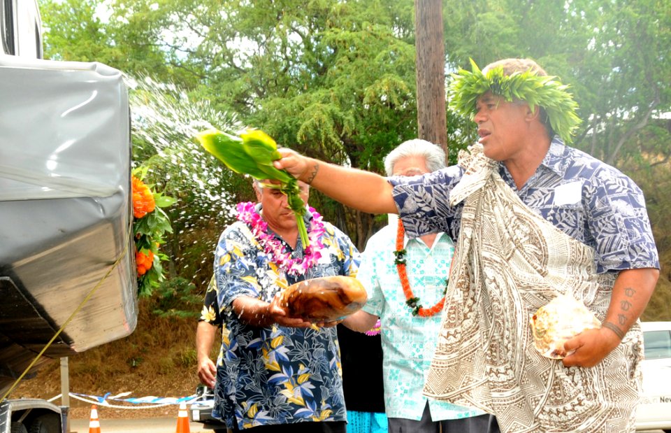 US Navy 090903-N-3666S-043 Kahu Kimokeo Kapahulehua performs a traditional Hawaiian blessing during a boat blessing ceremony