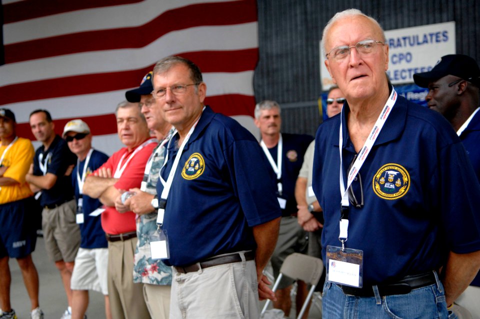 US Navy 090829-N-9818V-074 Former Master Chief Petty Officers of the Navy nd current MCPON Rick West watch as chief petty officer selects march to the amphitheatre at Kings Dominion during CPO Day