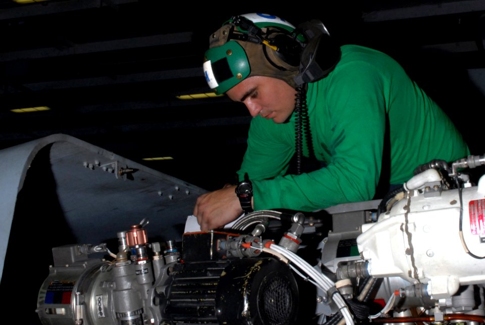 US Navy 090830-N-2600H-010 Aviation Structural Mechanic 2nd Class Bartley Petroff, assigned to the Indians of Helicopter Anti-Submarine Squadron (HS) 6,