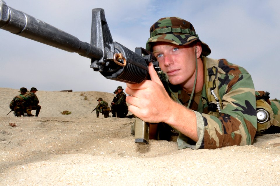 US Navy 090831-N-7883G-024 Basic Underwater Demolition-SEAL students conduct a patrolling exercise during the third phase of training at Naval Amphibious Base Coronado