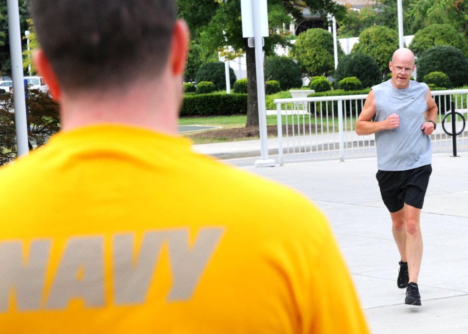US Navy 090903-N-2903M-225 Runners from the local YMCA participate in a one and a half mile Navy run in support of the Navy Fitness Challenge at the World's Fair Park in downtown Knoxville
