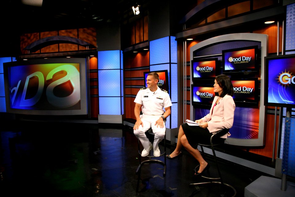 US Navy 090902-N-3271W-008 Lt. Cmdr. Andrew Baldwin, M.D., a Navy undersea medical officer, is interviewed by Emily Riemer during the WTTE Fox 28