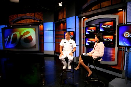 US Navy 090902-N-3271W-008 Lt. Cmdr. Andrew Baldwin, M.D., a Navy undersea medical officer, is interviewed by Emily Riemer during the WTTE Fox 28