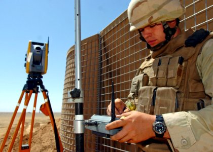 US Navy 090904-N-4440L-003 Engineering Aide 3rd Class William Anderson, assigned to Naval Mobile Construction Battalion (NMCB) 74, programs a Trimble S6 Total Station robotic surveying system
