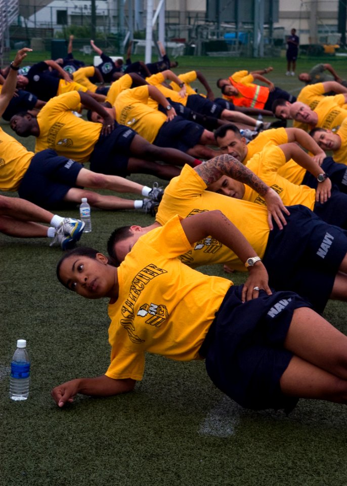 US Navy 090902-N-1251W-003 Chief petty officer (CPO) selects lead area commanders, flag officers and the Far East CPO Mess through a morning physical training session