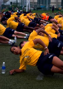 US Navy 090902-N-1251W-003 Chief petty officer (CPO) selects lead area commanders, flag officers and the Far East CPO Mess through a morning physical training session photo