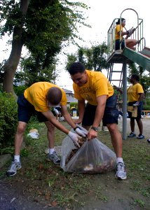 US Navy 090902-N-5253W-037 rea chief petty officer (CPO) selects clean up the Morisaki Playground photo