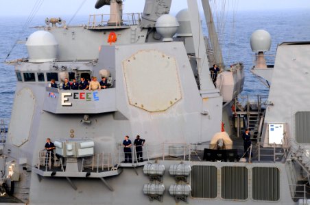 US Navy 090906-N-3610L-421 Sailors aboard the Arleigh Burke-class guided-missile destroyer USS Gridley (DDG 101) observe a fueling at sea with the aircraft carrier USS Ronald Reagan (CVN 76)