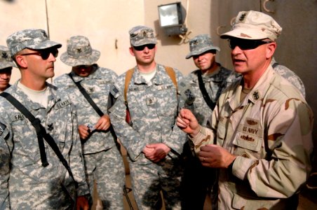 US Navy 090907-N-9818V-576 Master Chief Petty Officer of the Navy (MCPON) Rick West speaks with Sailors deployed in Baghdad. Iraq is West's second stop during his visit to the Central Command (CENTCOM) area of responsibility photo