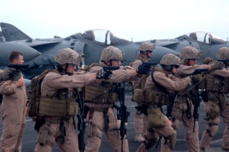 US Navy 090902-N-3592S-239 Marines assigned to the 24th Marine Expeditionary Unit (24th MEU) practice with M-9A1 pistols