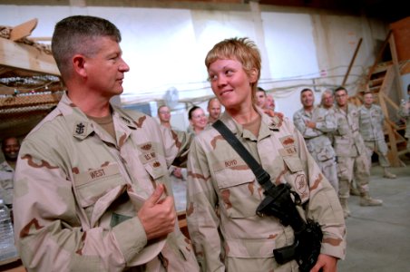 US Navy 090908-N-9818V-099 Master Chief Petty Officer of the Navy (MCPON) Rick West speaks with Seabees from Naval Construction Battalion (NMCB) 24 during a visit to Al Asad, Iraq