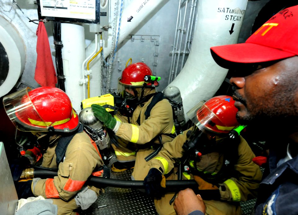 US Navy 090909-N-7280V-250 Chief Hull Maintenance Technician Rodney Booker, a Damage Control Training Team (DCTT) member