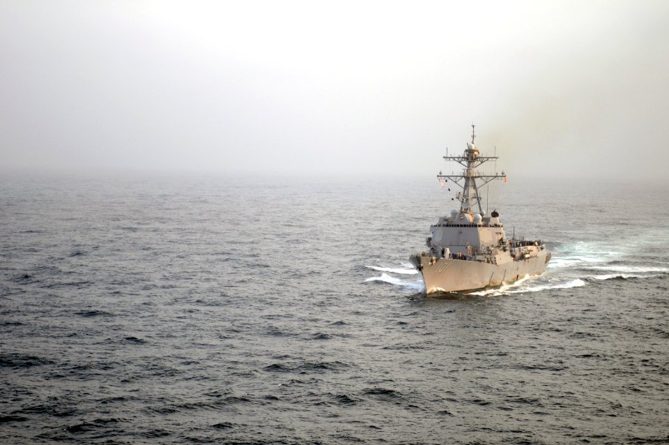 US Navy 090906-N-4995K-034 The Arleigh Burke-class guided-missile destroyer USS Gridley (DDG 101) approaches the aircraft carrier USS Ronald Reagan (CVN 76) for a fueling at sea,