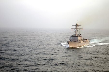 US Navy 090906-N-4995K-034 The Arleigh Burke-class guided-missile destroyer USS Gridley (DDG 101) approaches the aircraft carrier USS Ronald Reagan (CVN 76) for a fueling at sea,