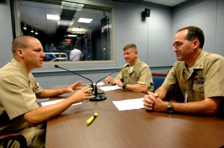 US Navy 090902-N-9818V-006 Senior Chief Mass Communication Specialist Bill Houlihan interviews Master Chief Petty Officer of the Navy (MCPON) Rick West photo