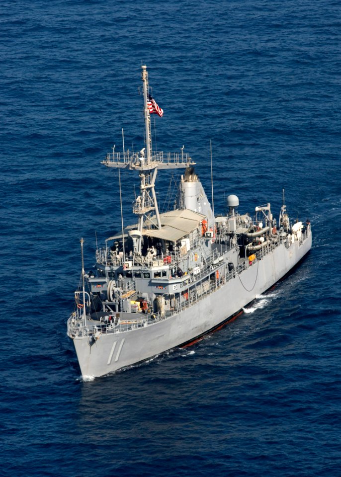 US Navy 090905-N-3165S-576 Mine countermeasure ship USS Gladiator (MCM 11) displays the U.S. flag as it conducts underway operations