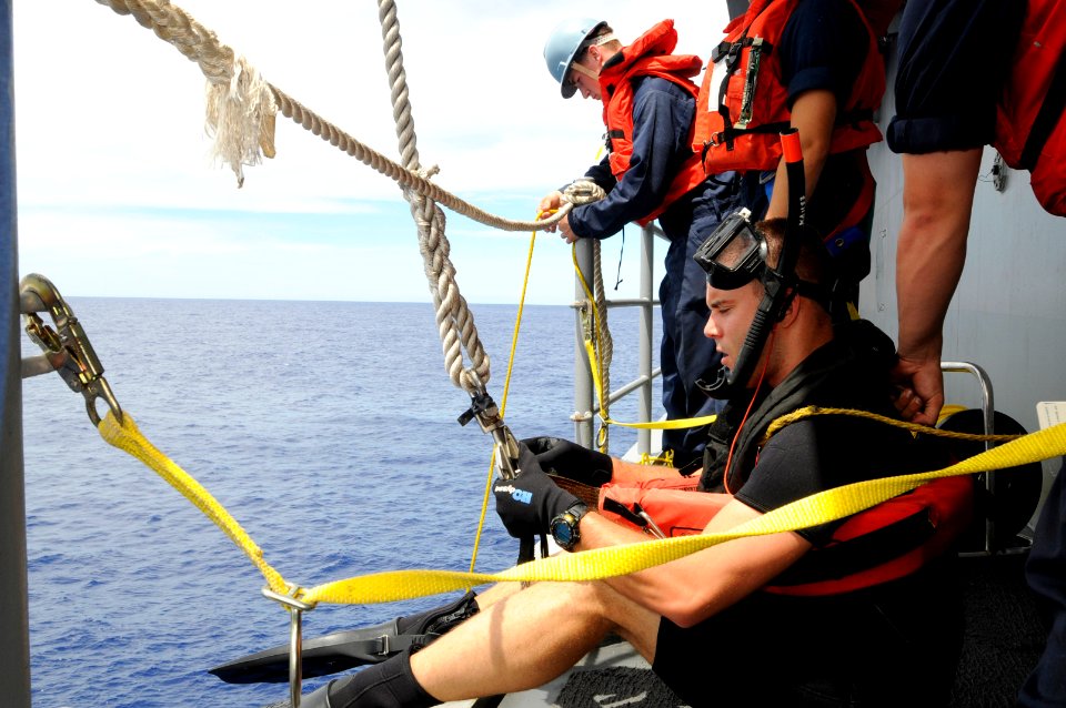 US Navy 090911-N-3830J-236 Information Systems Technician 2nd Class Kevin Abney, a search and rescue swimmer aboard the amphibious command ship USS Blue Ridge (LCC 19)