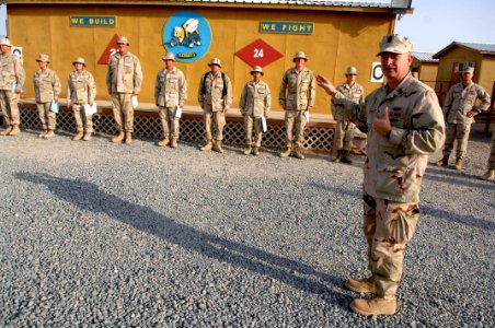 US Navy 090907-N-9818V-098 Master Chief Petty Officer of the Navy (MCPON) Rick West addresses Seabees at an awards ceremony after pinning the Seabee Combat Warfare insignia to nine newly-qualified Sailors at Camp Morrell