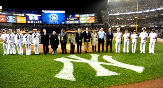 US Navy 090911-N-0413R-155 Sailors assigned to the amphibious transport dock ship Pre-Commisioning Unit (PCU) New York (LPD 21) and members of the commissioning committee are introduced during a pre-game ceremony at Yankee Stad