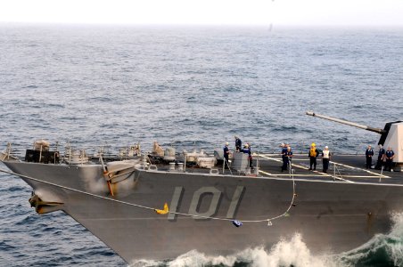 US Navy 090906-N-3610L-375 The Arleigh Burke-class destroyer USS Gridley (DDG 101) uses a phone and distance (P^D) line to connect with the aircraft carrier USS Ronald Reagan (CVN 76) during a fueling at sea (FAS) evolution