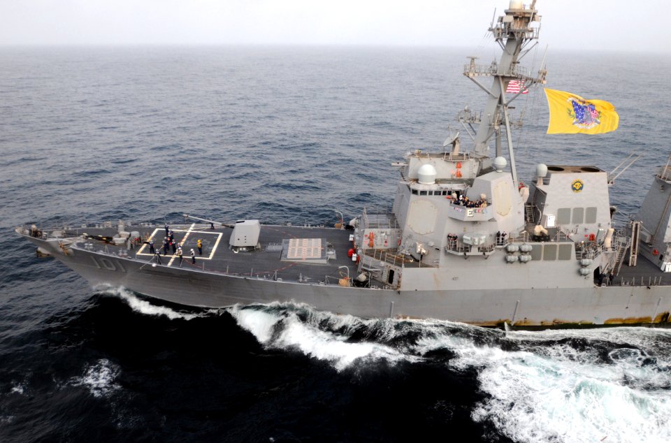 US Navy 090906-N-4995K-213 The Arleigh Burke-class guided-missile destroyer USS Gridley (DDG 101) transits alongside the aircraft carrier USS Ronald Reagan (CVN 76) during a fueling at sea,