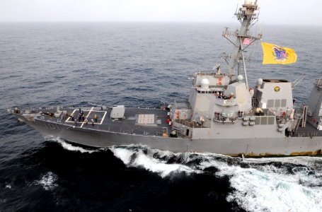 US Navy 090906-N-4995K-213 The Arleigh Burke-class guided-missile destroyer USS Gridley (DDG 101) transits alongside the aircraft carrier USS Ronald Reagan (CVN 76) during a fueling at sea,