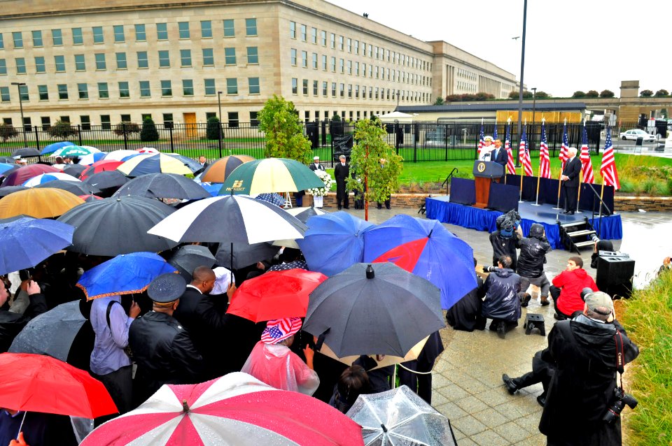 US Navy 090911-N-8273J-078 Family members and friends of victims of the Sept. 11, 2001 terrorist attack on the Pentagon listen as President Barack Obama delivers remarks during a Sept. 11 remembrance ceremony at the Pentagon Me
