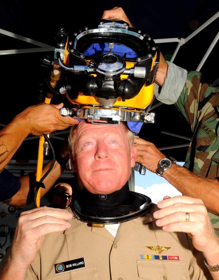 US Navy 090911-N-7498L-021 Adm. Robert Willard, commander, U.S. Pacific Fleet, dons diving headgear after presenting Mobile Diving and Salvage Unit (MDSU) 1 the Meritorious Unit Commendation award at Naval Station Pearl Harbor